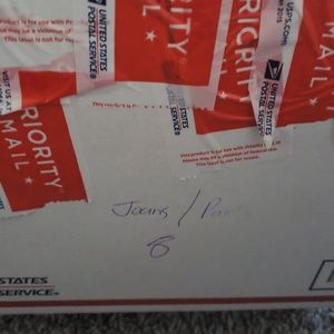 Mystery box international adoption fund  jeans/ect